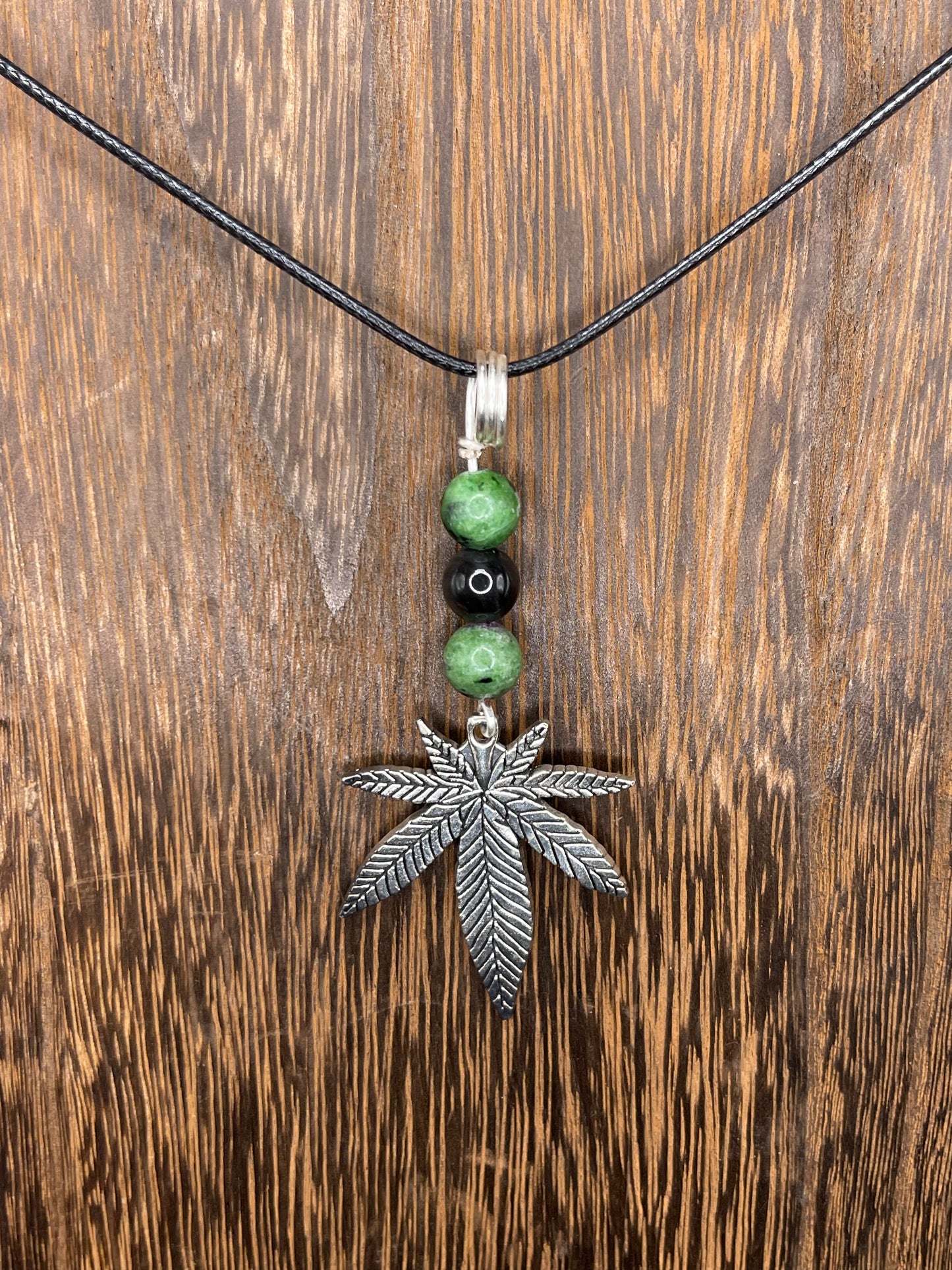 ✨ Nature’s Harmony: Ruby Zoisite and Obsidian Crystal Necklace with Marijuana Leaf Charm ✨