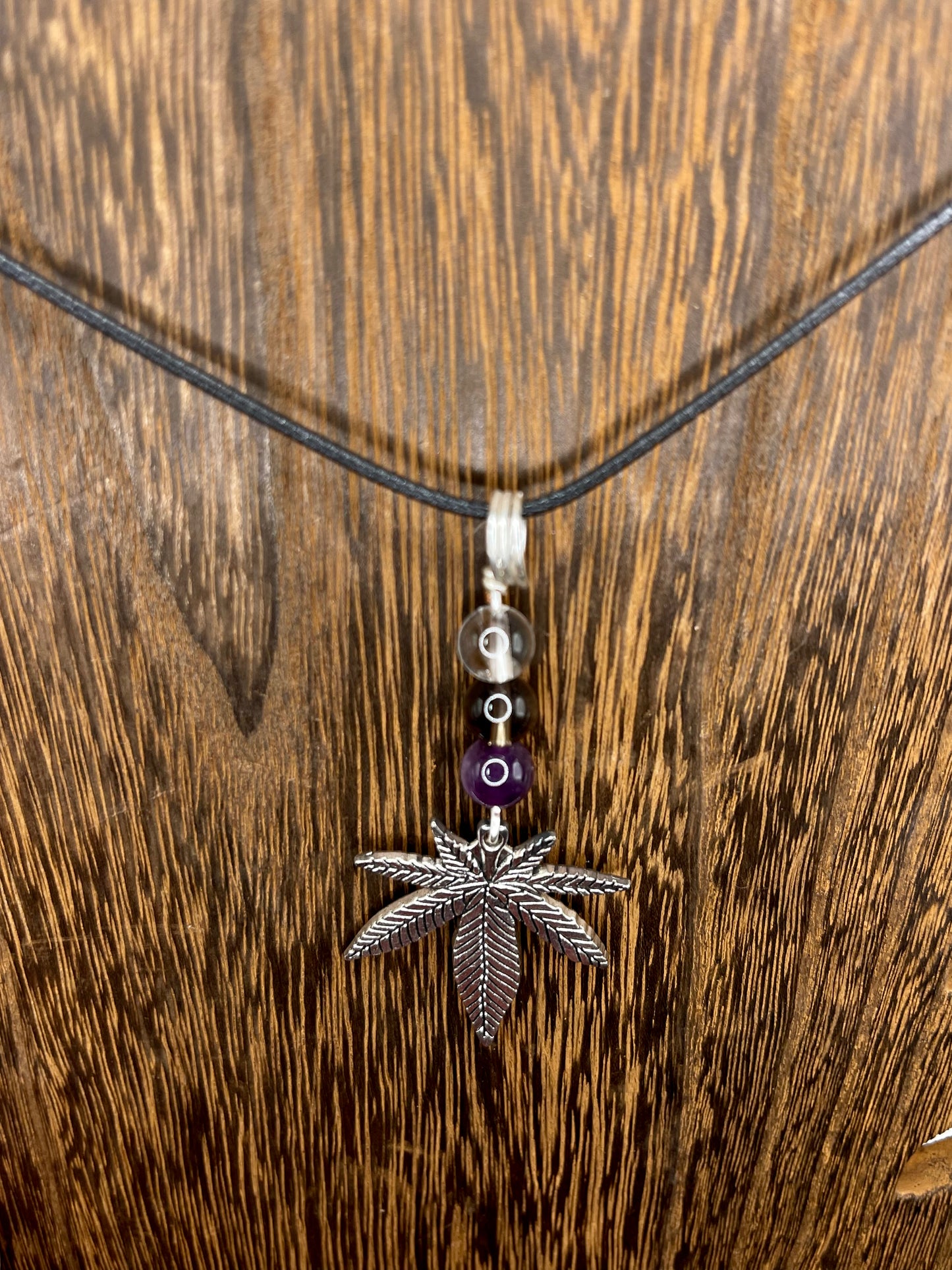 ✨ Nature’s Harmony: Clear Quartz, Smoky Quartz and Amethyst Crystal Necklace with Marijuana Leaf Charm ✨