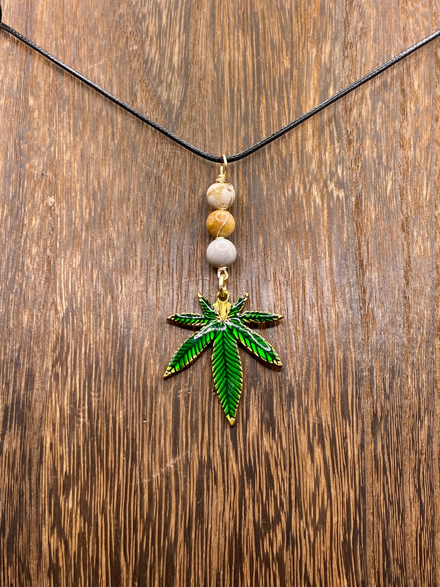 ✨ Nature’s Harmony: Coral Jade Crystal Necklace with Marijuana Leaf Charm ✨