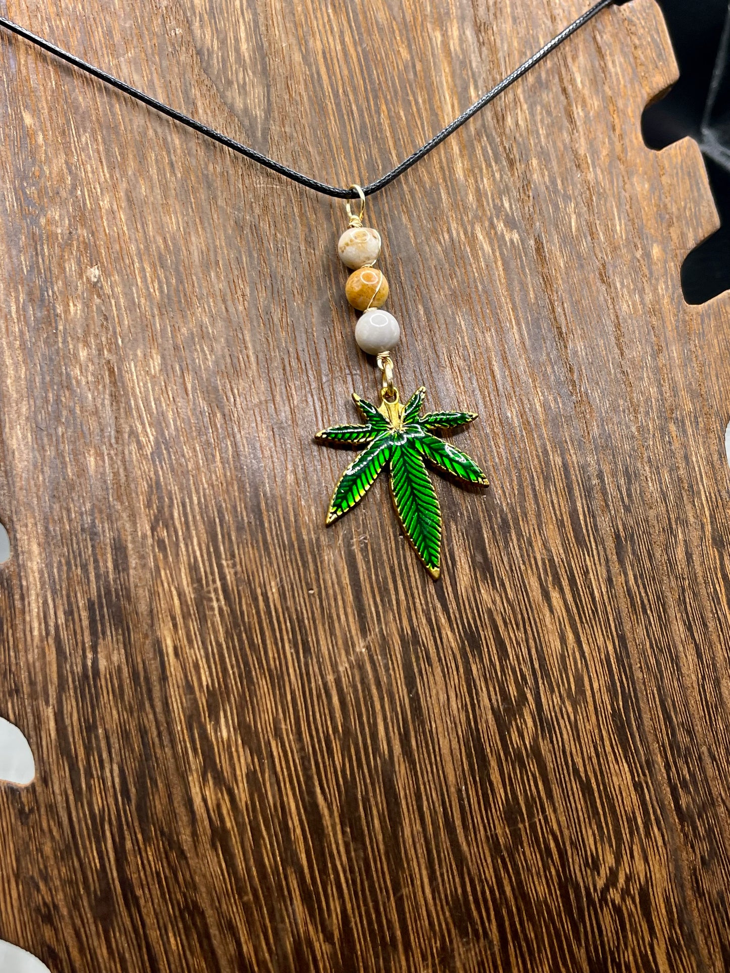 ✨ Nature’s Harmony: Coral Jade Crystal Necklace with Marijuana Leaf Charm ✨