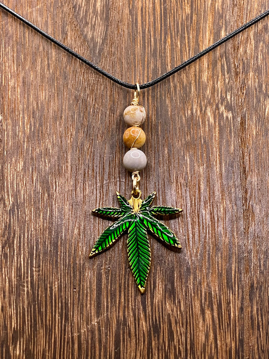 ✨ Nature’s Harmony: Coral Jade Crystal Necklace with Marijuana Leaf Charm ✨